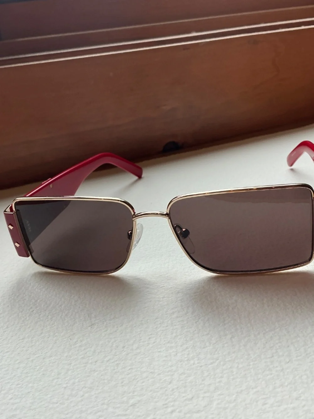 MCM Red and Gold Shield Sunglasses with crossbody case